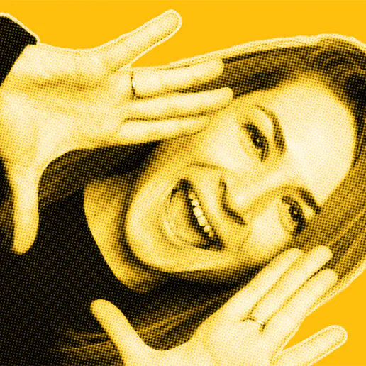 Yellow-filtered portrait of Anastasiya fom DAVID Systems smiling and holding both hands to the side of her face