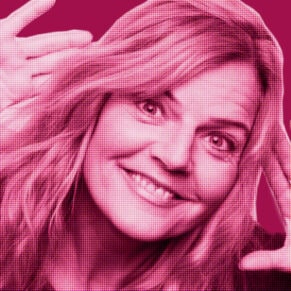 Pink-filtered portrait of a woman smiling holding her hands to the side of the head