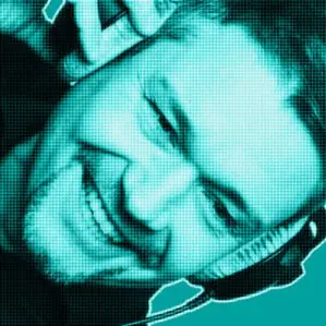 Green-filtered portrait of a man smiling wearing headphones